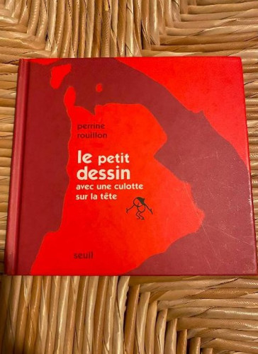 Portada del libro de LE PETIT DESSIN AVEC UNE CULOTTE SUR LA TETE. PERRINE ROUILLON. SEUIL, 2001.