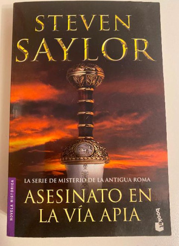 Portada del libro de ASESINATO EN LA VÍA APIA, LA SERIE DE MISTERIO DE LA ANTIGUA ROMA. STEVEN SAYLOR. BOOKET, 2007.