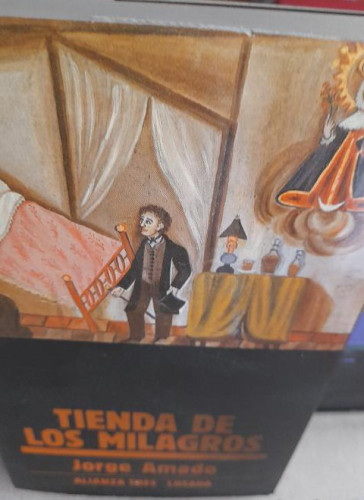 Portada del libro de Tienda de los milagros. Jorge Amado. alianza tres 1981 327pp