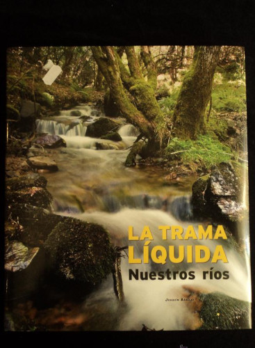 Portada del libro de LA TRAMA LIQUIDA. NUESTROS RIOS. JOAQUIN ARAUJO. CLH. LUNWERG. 2009 307 PAG