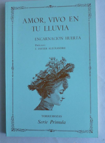 Portada del libro de AMOR, VIVO EN TU LLUVIA ENCARNACIÓN HUERTA. TORREMOZA. 1987 59 PAG DEDICATORIA AUTORA