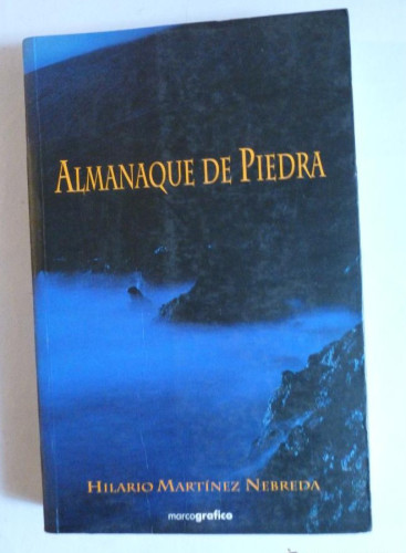 Portada del libro de ALMANAQUE DE PIEDRA. HILARIO MARTINEZ NEBREDA. MARCOGRAFICO. 334 PAG DEDICATORIA AUTOR