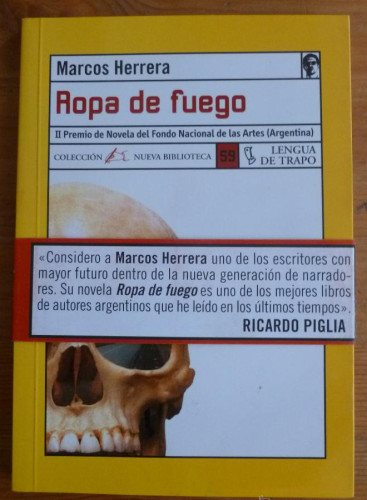 Portada del libro de ROPA DE FUEGO. MARCOS HERRERA. LENGUA DE TRAPO. 2001 152 PAG