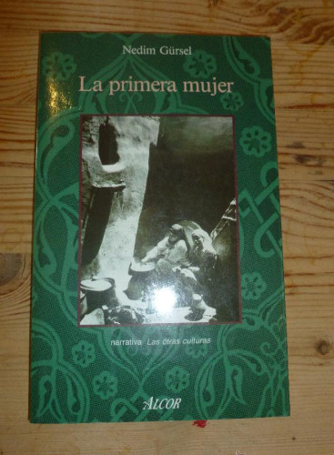 Portada del libro de LA PRIMERA MUJER. NEDIM CURSEL. ALCOR. 1988 137 pp