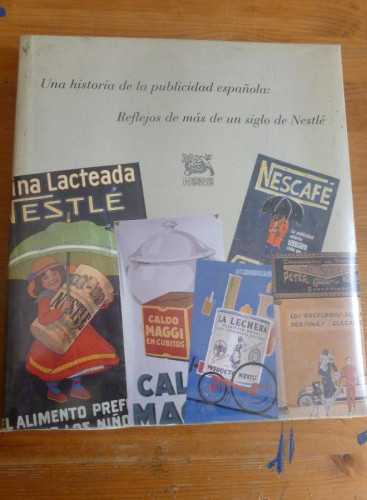 Portada del libro de REFLEJOS DE MAS DE UN SIGLO DE NESTLE. HISTORIA PUBLICIDAD ESPAÑOLA. NESTLE. 1992 305 pp