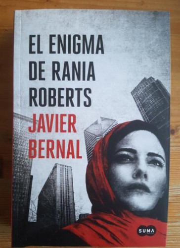 Portada del libro de El enigma de Rania Roberts Bernal, Javier Publicado por Suma de Letras, España (2014)