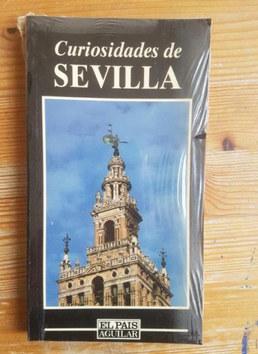 Portada del libro de CURIOSIDADES DE SEVILLA. EL PAIS AGUILAR. NUEVO. PRECINTADO