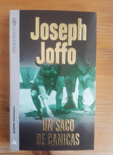 Portada del libro de Un saco de canicas Joseph Joffo Publicado por Grijalbo Mondadori (1995) 290pp