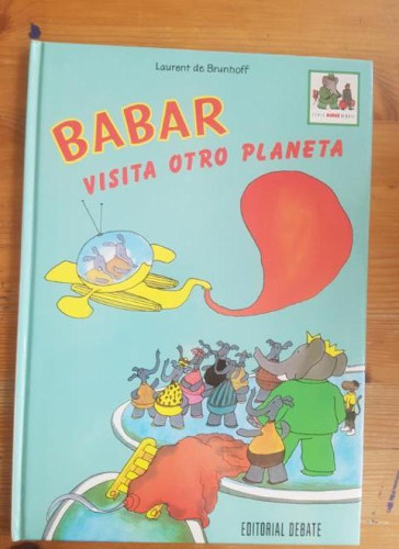 Portada del libro de BABAR VISITA OTRO PLANETA Laurent de Brunhoff ed. DEBATE 1980 30 pp