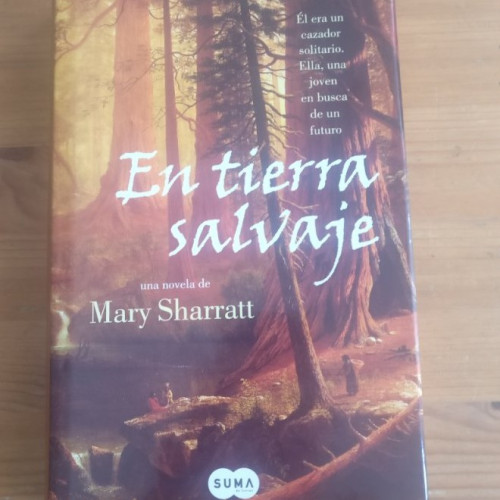 Portada del libro de En tierra salvaje Mary Sharratt Publicado por SUMA DE LETRAS 2006 413pp
