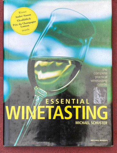 Portada del libro de Essential Winetasting. Schuster, Michael. 2000. Mitchell Beazley.